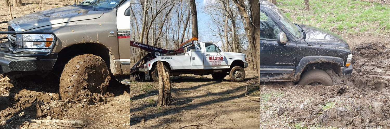 Trucks stuck in the mud, towing truck