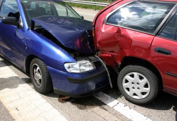 Looks like towing services and auto body repairs are needed for these two cars.
